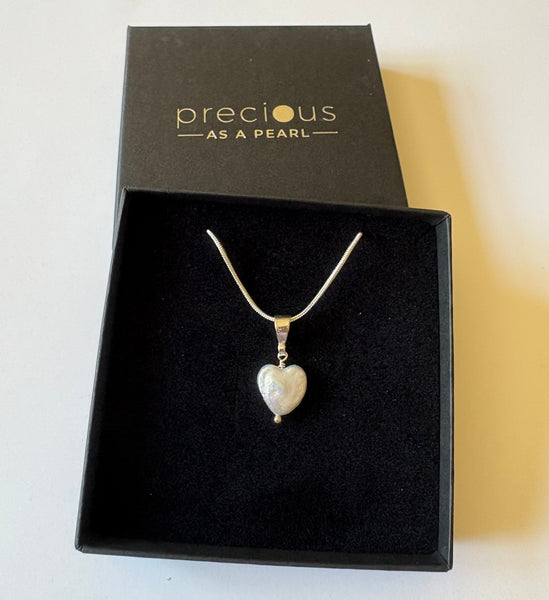 Pendant: Heart shaped freshwater pearl pendant on silver bail