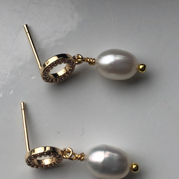 Earrings: Ivory freshwater pearl drop on a delicate pretty gold plated post