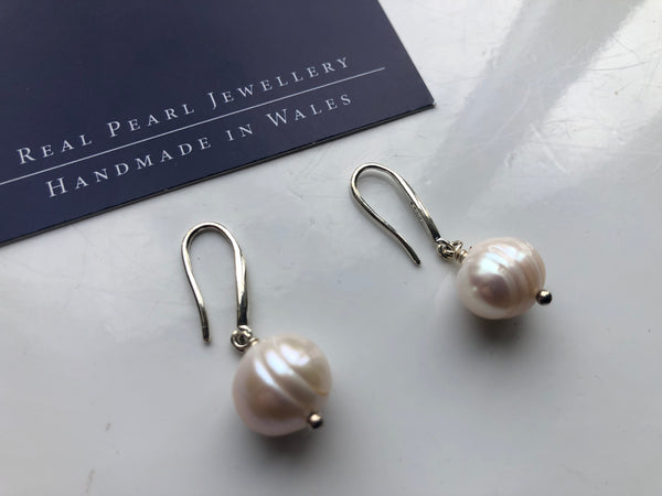 Earrings: Large single ivory pearl drop earrings - classic