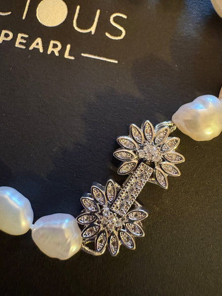 Necklace: Dainty freshwater pearl necklace with a pink hue