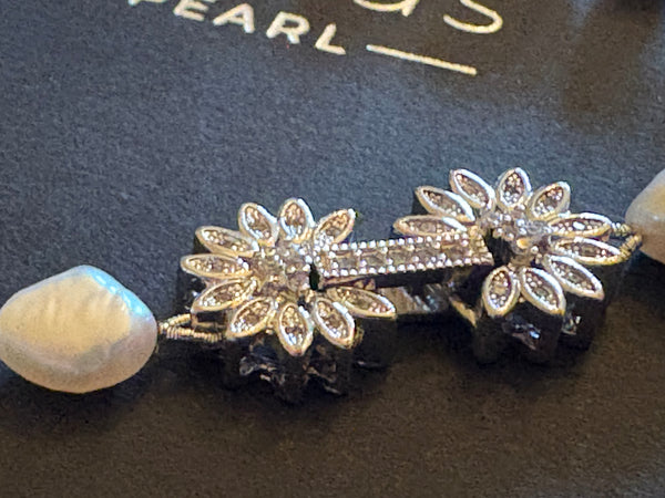 Necklace: Dainty freshwater pearl necklace with a pink hue