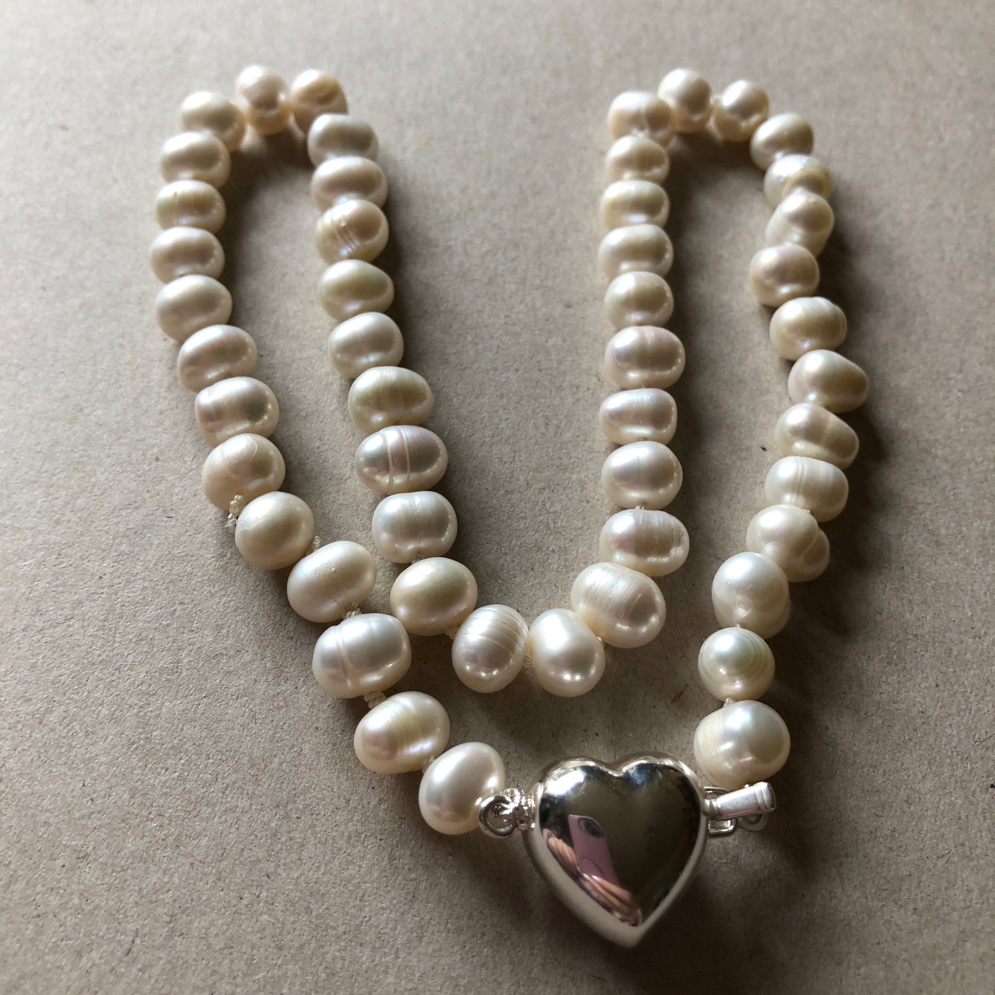 Necklace - Ivory Baroque freshwater pearls with silver heart clasp