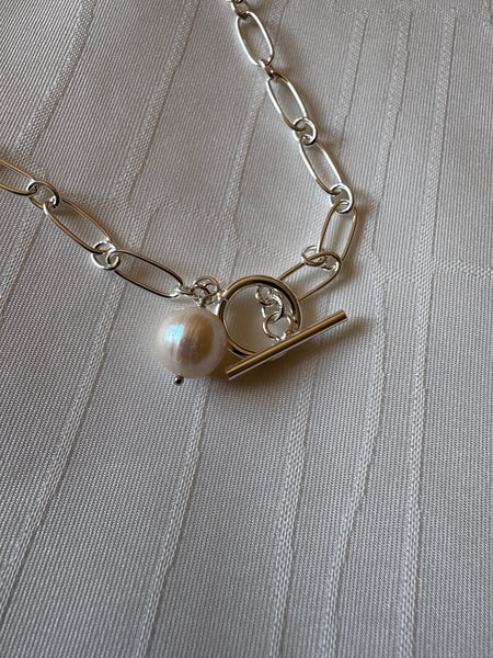 Necklace: Large freshwater pearl on a silver link chain with a toggle clasp
