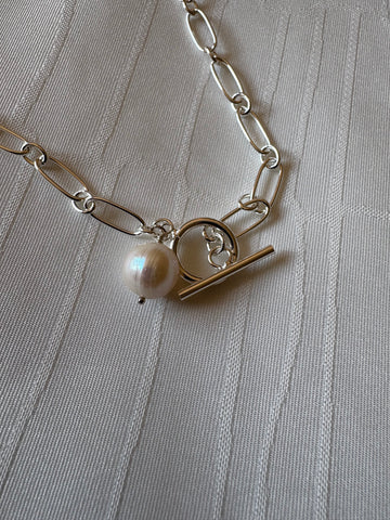 Necklace: Large freshwater pearl on a silver link chain with a toggle clasp