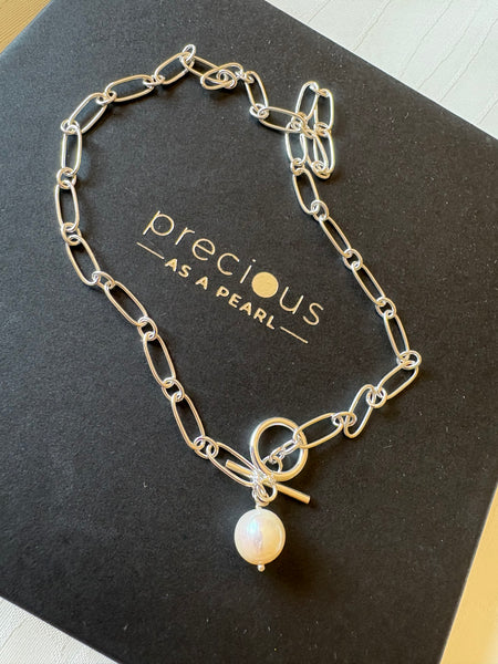Necklace: Large freshwater pearl on a silver link chain with a toggle clasp