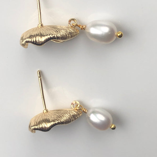 Earrings: Ivory freshwater pearl teardrop on gold-plated leaf post